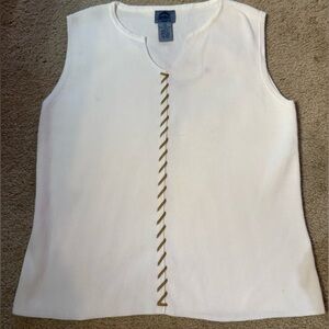 Cambridge Dry Goods white sweater knit top with suede stitching.